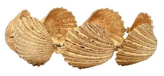 14 Karat Gold Shell Bracelet, having seven shell forms, marked 14K, 24.3 grams.
