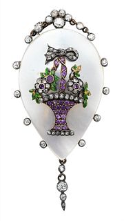 Victorian Mother of Pearl Brooch, mounted with amethyst, diamond, and enameled basket having 21 diamonds around the edge, height 3 inches.