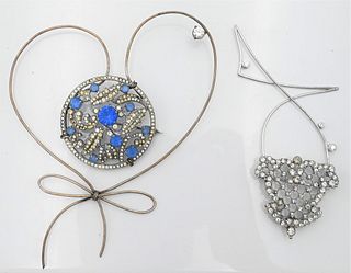 Two Depy Chandris Brooches, to include a heart shaped, having Depy Chandris guarantee certification; along with a silver brooch, signed.