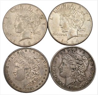 Four Silver Dollars, to include two Morgan and two Peace.