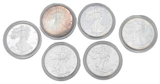 Six Silver Eagles, to include 1999 one dollar American Eagle proofs, 2000 one dollar proofs American silver Eagle, along with one dollar uncirculated 