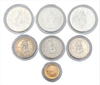 Lot of 7 Coins, congressional set to include 2 uncirculated copper nickel half dollars, 1 proof half-dollar, 2 uncirculated silver dollars, 1 proof si