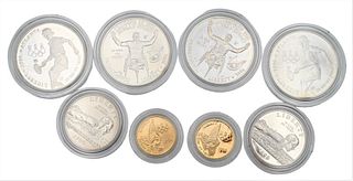 Eight Piece Coin Lot, to include two 5 dollar gold, one uncirculated and one proof, along with four 1996 Atlanta Olympics coins, to include two copper