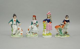 (4) Staffordshire Pottery Figural Groups.