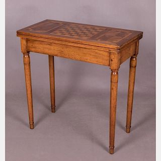 A Georgian Style Mahogany and Fruitwood Parquetry Games Table, 19th Century.