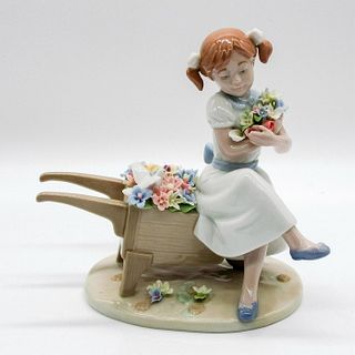 Nadal Porcelain Figurine, Girl on Wheelbarrow 2727