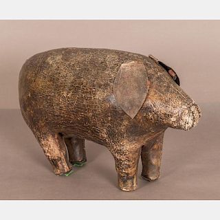 A  Dimitri Omersa (1927-1985) Abercrombie and Fitch Leather Pig Foot Stool.