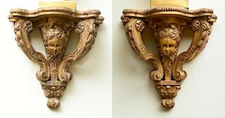NEAR PAIR OF RÉGENCE STYLE CARVED GILTWOOD WALL BRACKETS