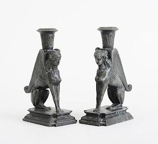 PAIR OF EMPIRE STYLE CAST-METAL SPHINX-FORM CANDLESTICKS