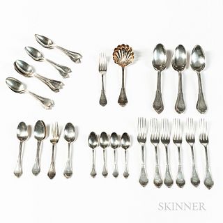Coin and Sterling Silver Partial Flatware in the Same Pattern
