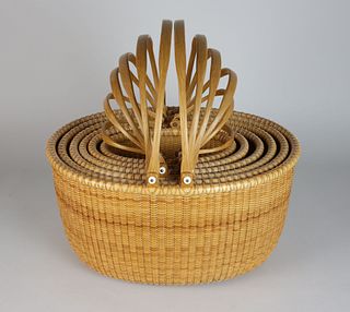 Nest of Six Bill and Judy Sayle Oval Nantucket Double Swing Handle Baskets, circa 1997
