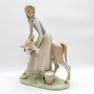 Girl with Calf 1014513 - Lladro Porcelain Figurine