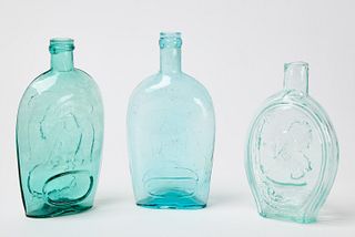 Three Embossed Glass Flasks