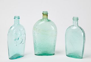 Three Embossed Blown Glass Flasks