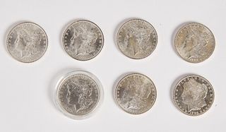 Seven Morgan Silver Dollars
