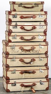 Stack of 8 Vintage Military Issue Suitcases