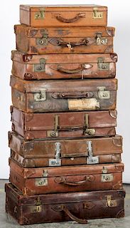 Stack of 8 Vintage English Leather Suitcases