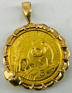 Gold Coin In A 14kt Yellow Gold Bezel Setting
