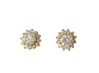 14kt Yellow Gold Diamond Solitaire Earrings With A Pair Of Matching 14kt Yellow Gold & Diamond Halo Earring Jackets.