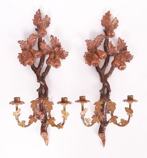 A Pair of Carved Wood and Tole Sconces