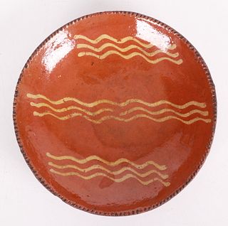 A 19th Century Redware Pie Plate