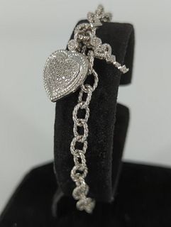 Sterling Silver Bracelet With A Heart Shaped Diamond Cluster Charm