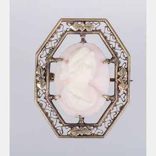 A Silver and Shell Cameo Brooch.