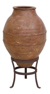 LARGE TERRACOTTA BANDED OLIVE JAR & IRON STAND