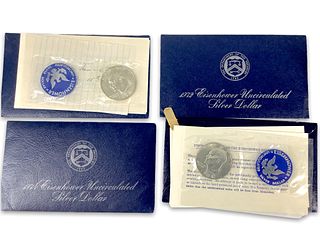 Four Uncirculated Eisenhower Silver Dollar Coins