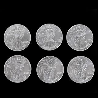 Six US $1 Silver Eagle Coins