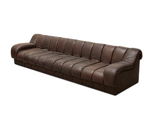 A custom De Sede-style leather sectional sofa