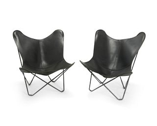 A pair of Cuero leather "Butterfly" chairs