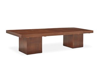 A mid-century modern extendable coffee table