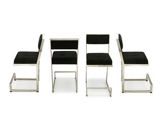 A set of chromed metal bar stools