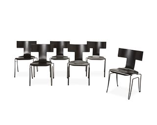 A set of contemporary T-back dining chairs