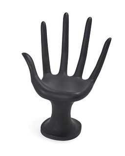 A mid-century modern black hand chair