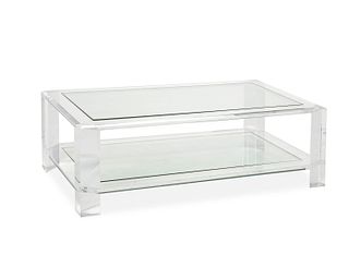 A vintage glass and Lucite coffee table
