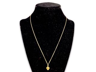14kt Yellow Gold Chain With an 18kt Gold Pendant