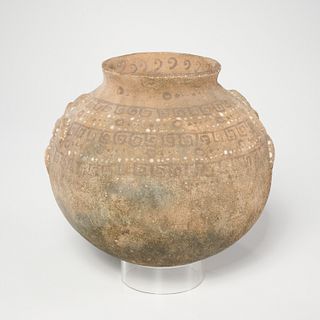 Archaic pottery vessel with humanoid handles