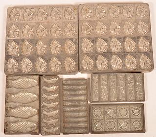 Seven Vintage Tray Form Chocolate Molds.