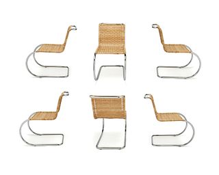 A set of Ludwig Mies Van Der Rohe-style chairs