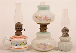 Three Antique Milk Glass Miniature Fluid Lamps.