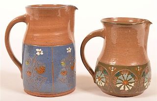 Two Hay Creek Pottery Floral Pitchers.