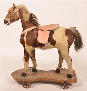 Antique Hyde Covered Horse Riding Toy.