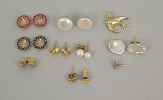 Small Group of Earring Fragments and a Dental Piece.