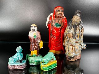 7 Chinese Sculptures of Buddhist and Daoist Figures and Miniature Dogs