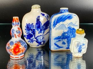 Four Blue and White Porcelain Snuff Bottles