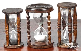 Three antique sand timers in rosewood and pine