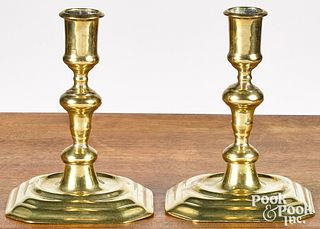 Pair of English William and Mary brass candlestick