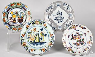 Four Delft polychrome plates, 18th c.